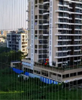 Invisible grill installation work for balcony safety